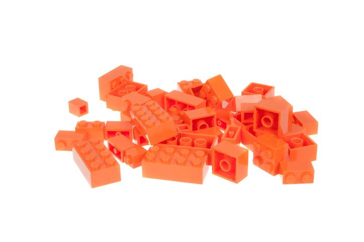 Orange LEGO® Bricks Against A White Background